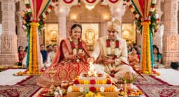 Couple taking vows during a Jain wedding ceremony